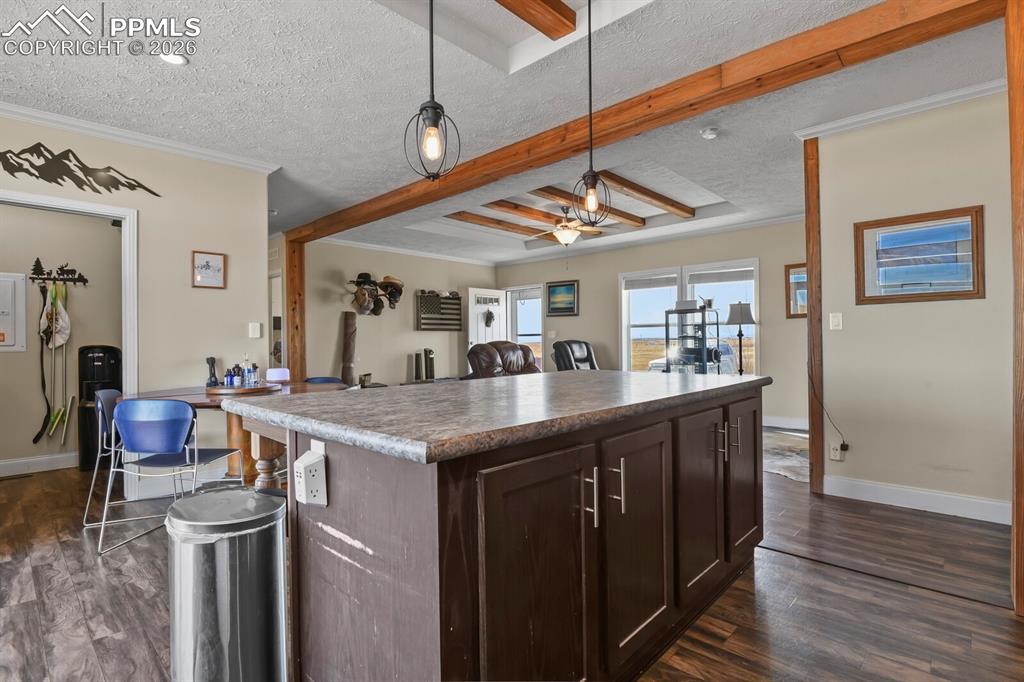 5895 Bar 10 Road Colorado Springs, CO 80928 - Photo 10 of 50 a kitchen with a table and chairs