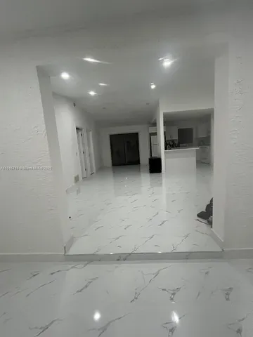 a bedroom with a bed and a cabinets