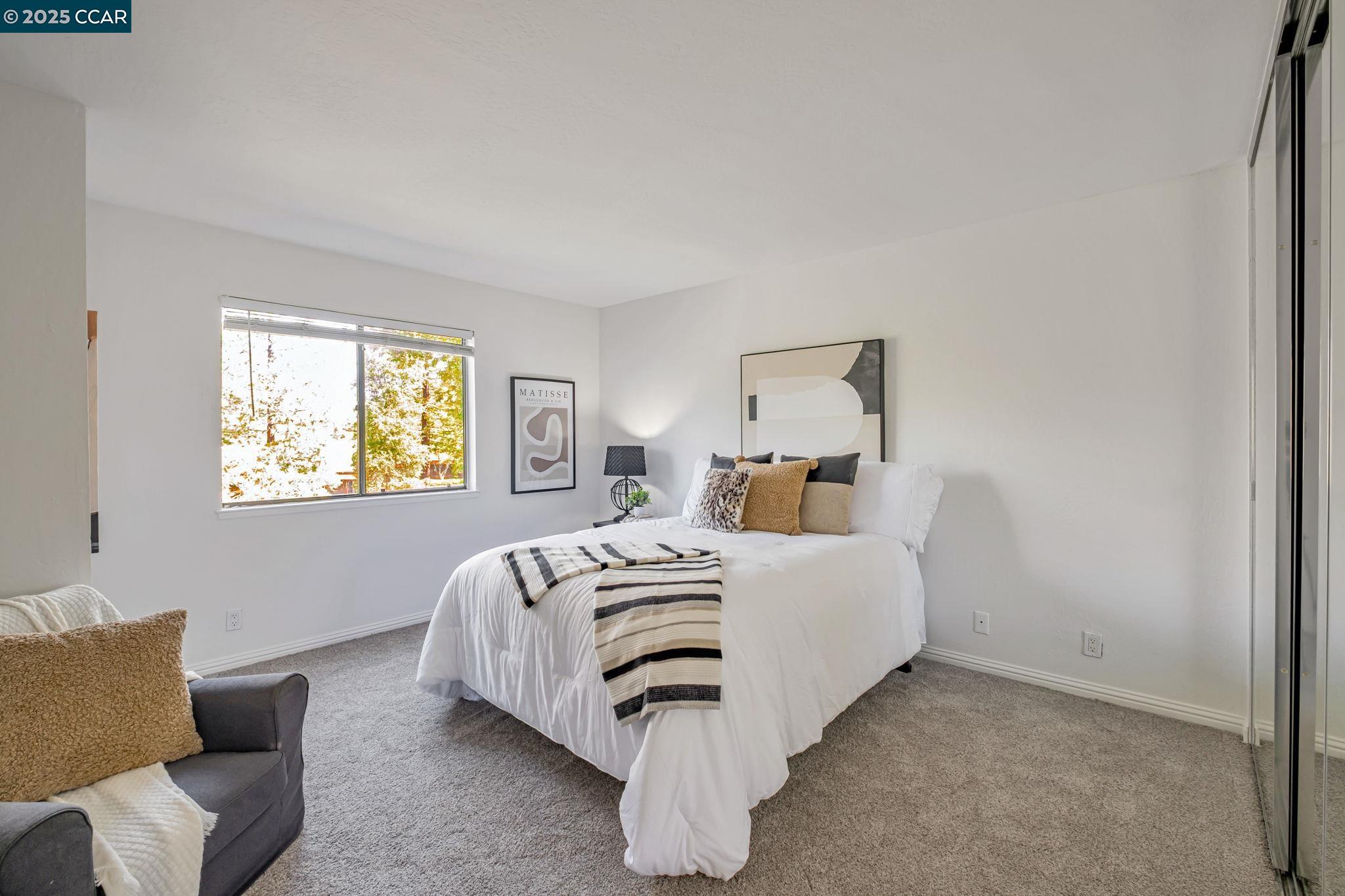 849 Tampico Walnut Creek, CA 94598 - Photo 15 of 24 a bedroom with a bed and a couch