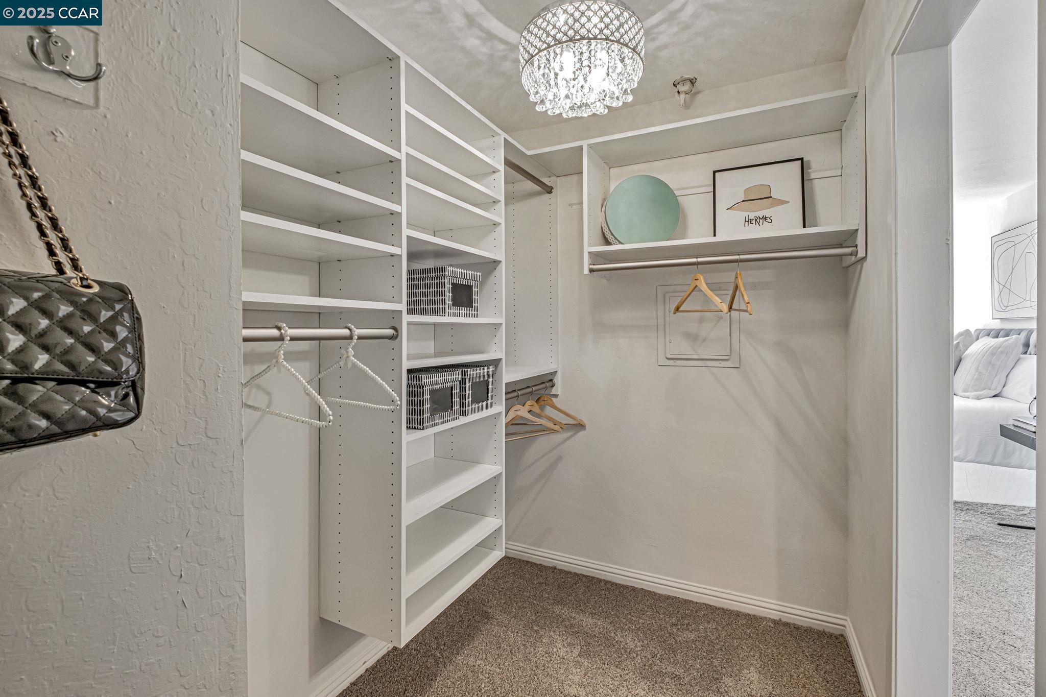 849 Tampico Walnut Creek, CA 94598 - Photo 17 of 24 a view of a bedroom with racks on the wall