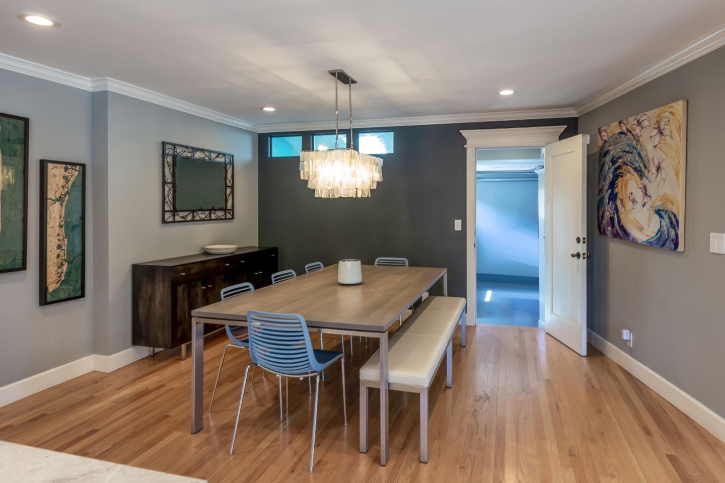 915 Cherrystone Drive Los Gatos, CA 95032 - Photo 12 of 37 a view of a dining room with furniture and wooden floor