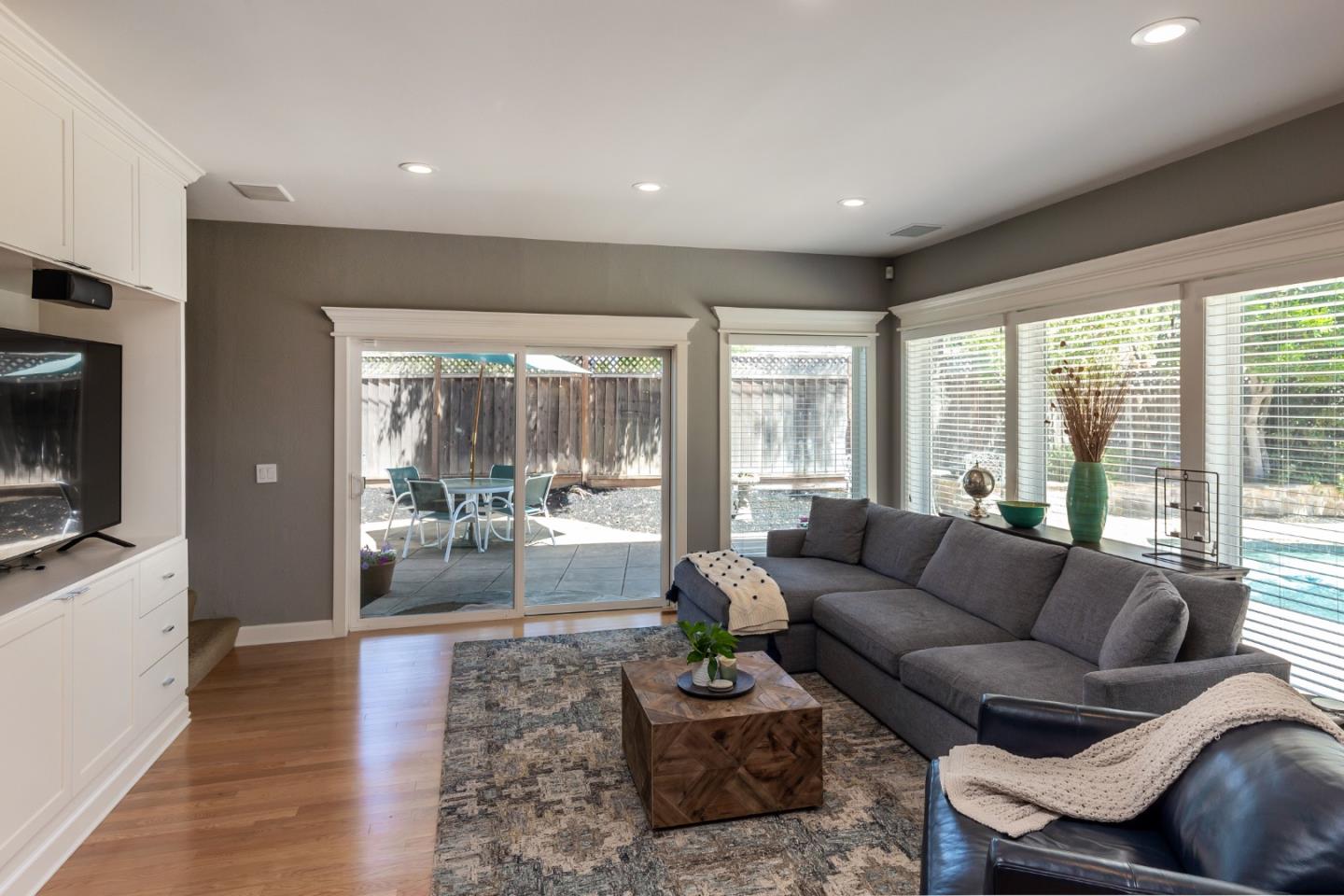 915 Cherrystone Drive Los Gatos, CA 95032 - Photo 13 of 37 a living room with furniture and a large window
