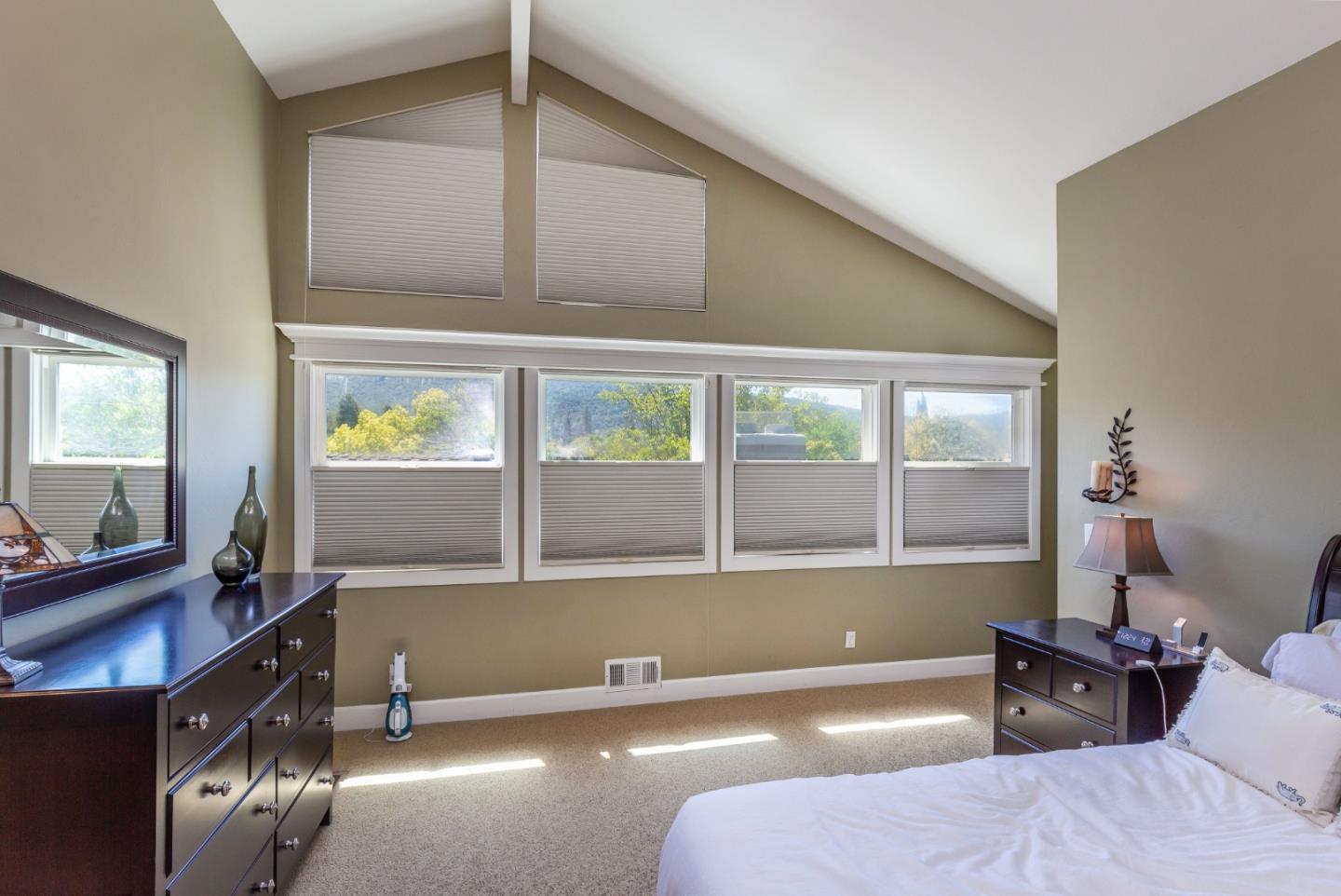 915 Cherrystone Drive Los Gatos, CA 95032 - Photo 16 of 37 a room with a window and mirror