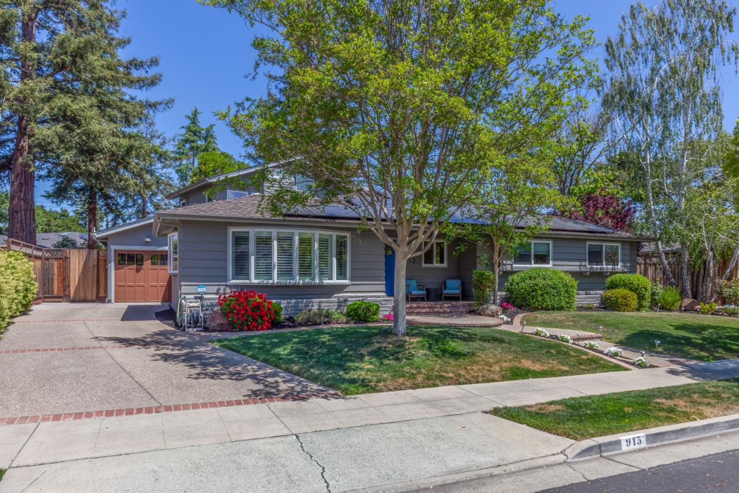 915 Cherrystone Drive Los Gatos, CA 95032 - Photo 2 of 37 front view of a house next to a yard