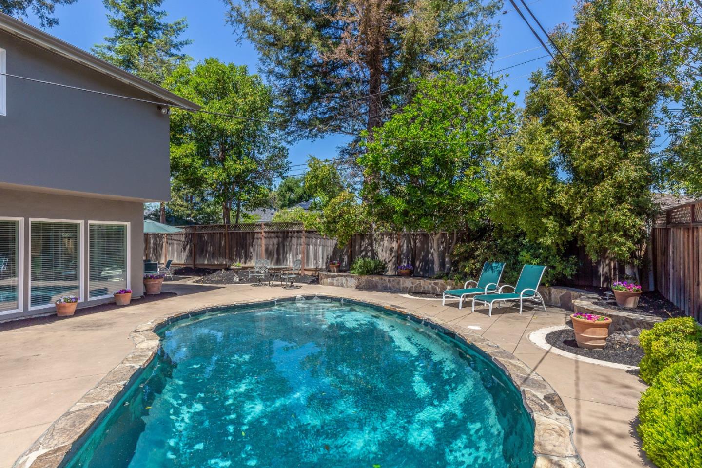 915 Cherrystone Drive Los Gatos, CA 95032 - Photo 33 of 37 a view of a backyard with sitting area