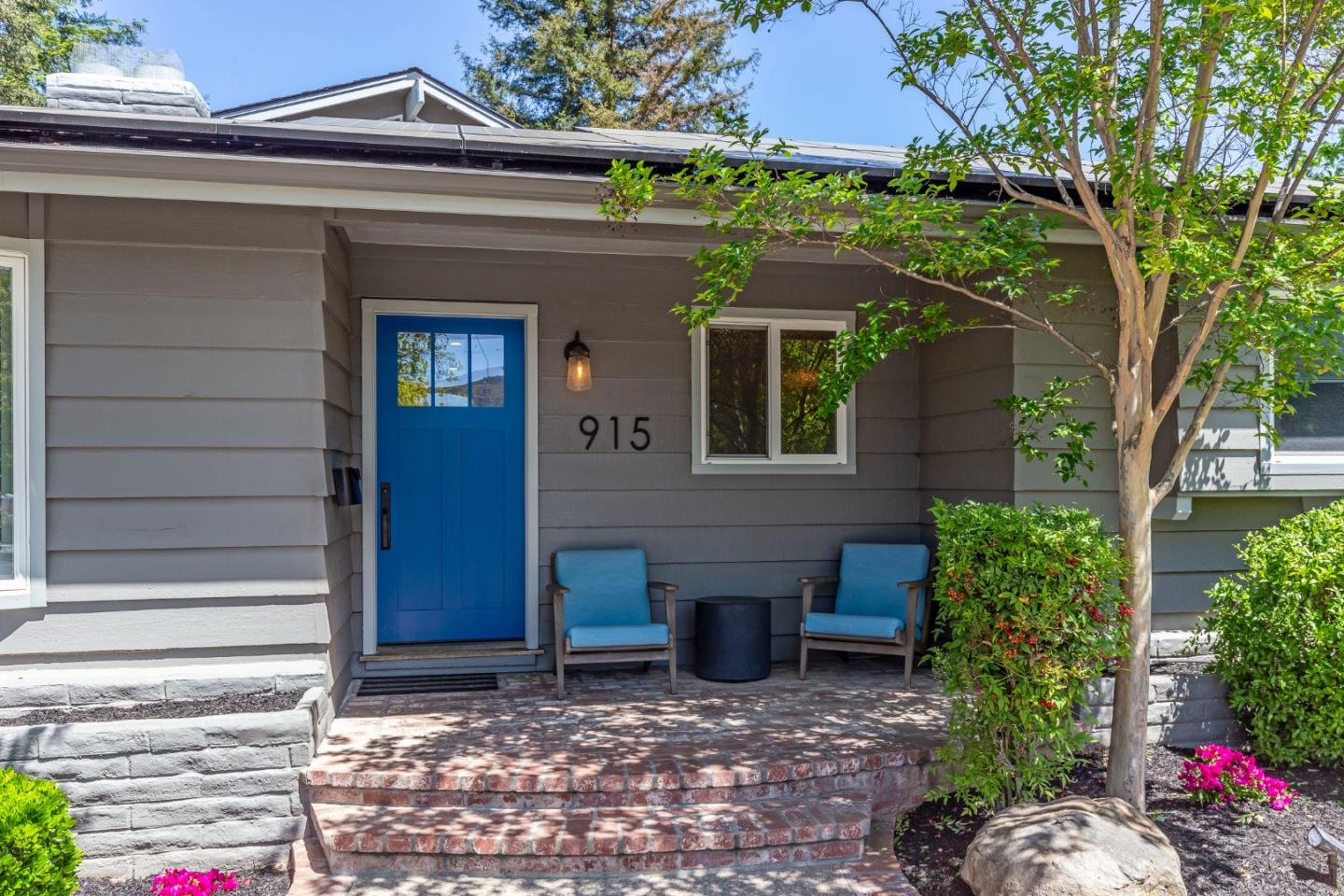 915 Cherrystone Drive Los Gatos, CA 95032 - Photo 4 of 37 a front view of a house with garden