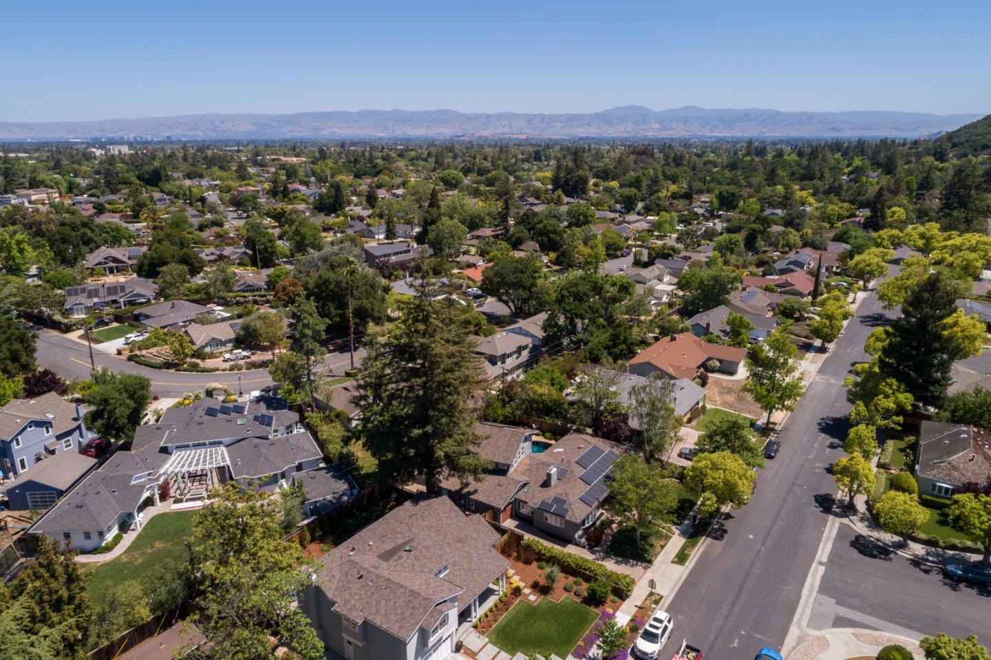 915 Cherrystone Drive Los Gatos, CA 95032 - Photo 6 of 37 an aerial view of a city with lots of residential buildings