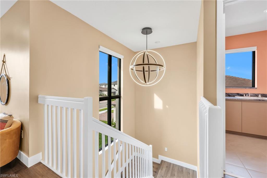 5074 Panella Avenue Immokalee, FL 34142 - Photo 30 of 48 a view of a hallway with furniture