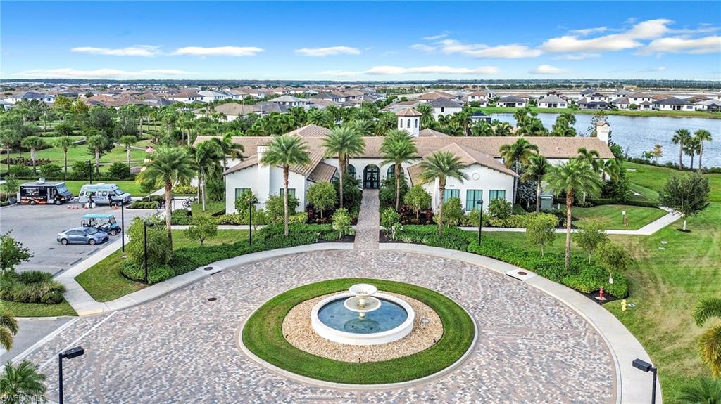 5074 Panella Avenue Immokalee, FL 34142 - Photo 39 of 48 an aerial view of residential houses with outdoor space and trees
