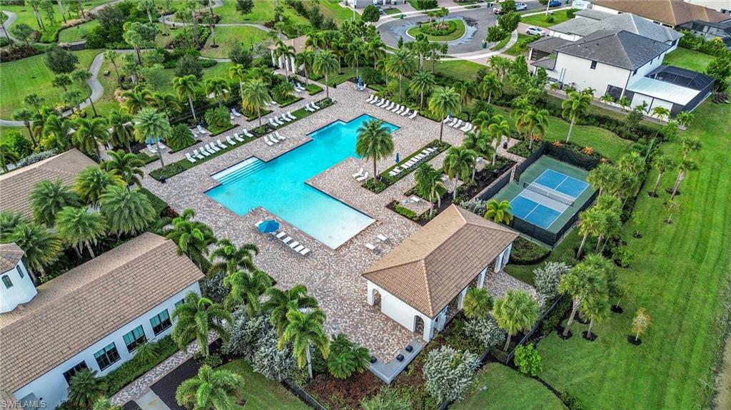 5074 Panella Avenue Immokalee, FL 34142 - Photo 40 of 48 an aerial view of a house with a garden