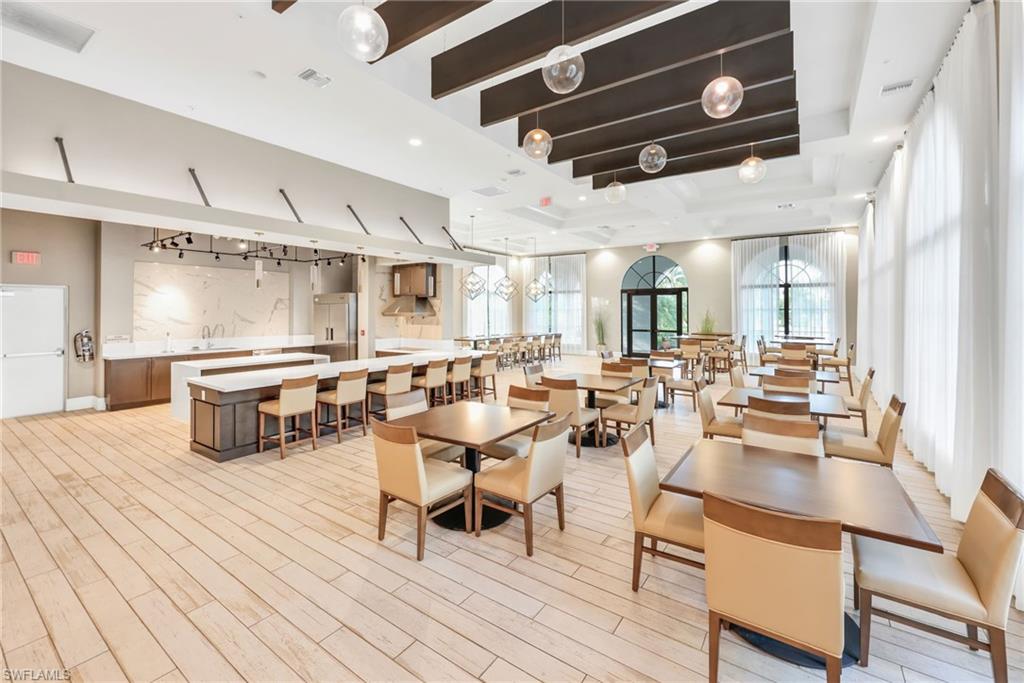 5074 Panella Avenue Immokalee, FL 34142 - Photo 41 of 48 a room with lots of furniture and white walls