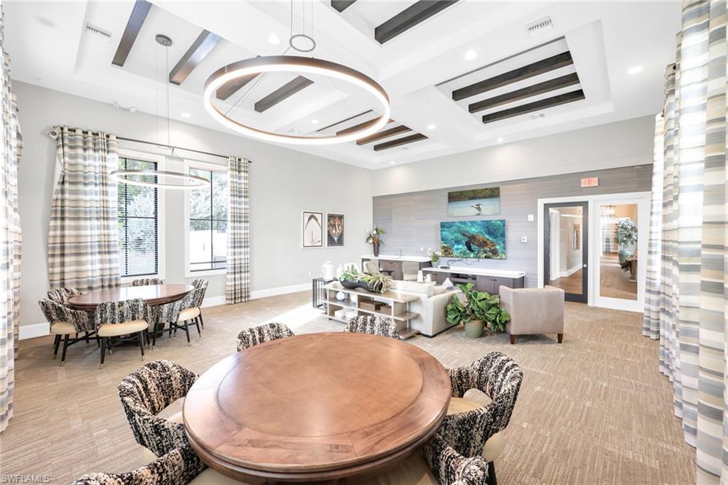 5074 Panella Avenue Immokalee, FL 34142 - Photo 43 of 48 a living room with furniture and wooden floor