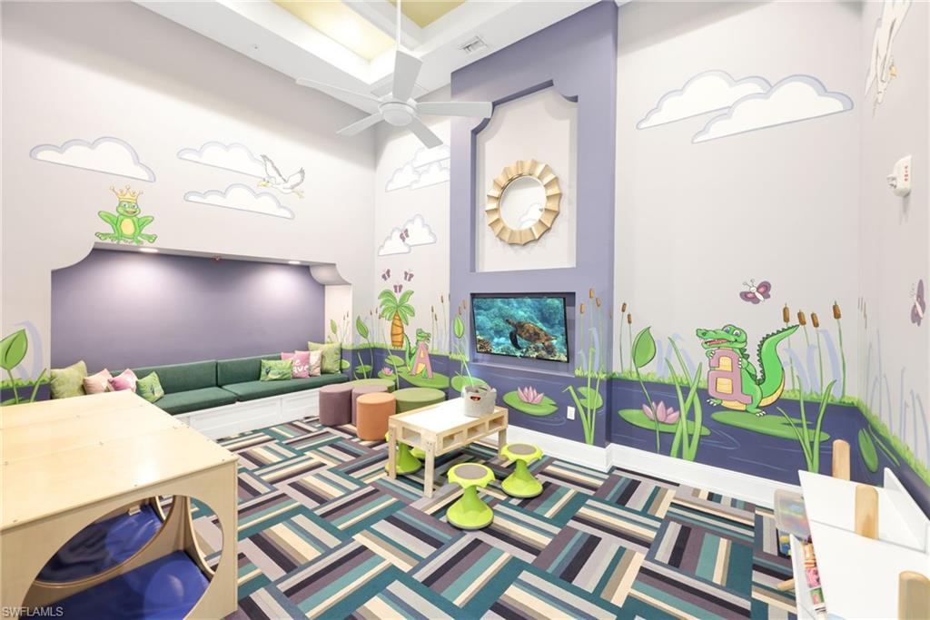 5074 Panella Avenue Immokalee, FL 34142 - Photo 45 of 48 a living room with patio furniture and a potted plant