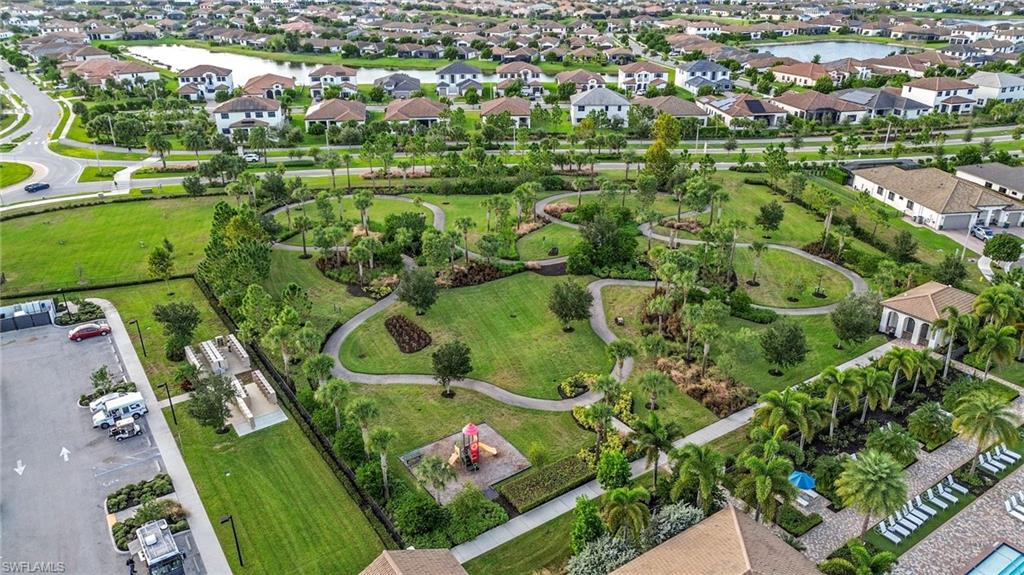 5074 Panella Avenue Immokalee, FL 34142 - Photo 47 of 48 an aerial view of a residential houses with outdoor space and street view