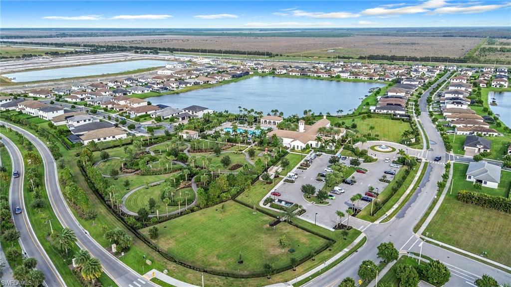 5074 Panella Avenue Immokalee, FL 34142 - Photo 48 of 48 a view of a swimming pool with a yard