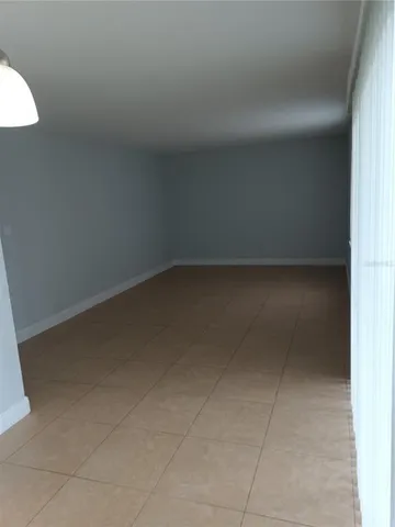 a stove top oven sitting inside of a kitchen