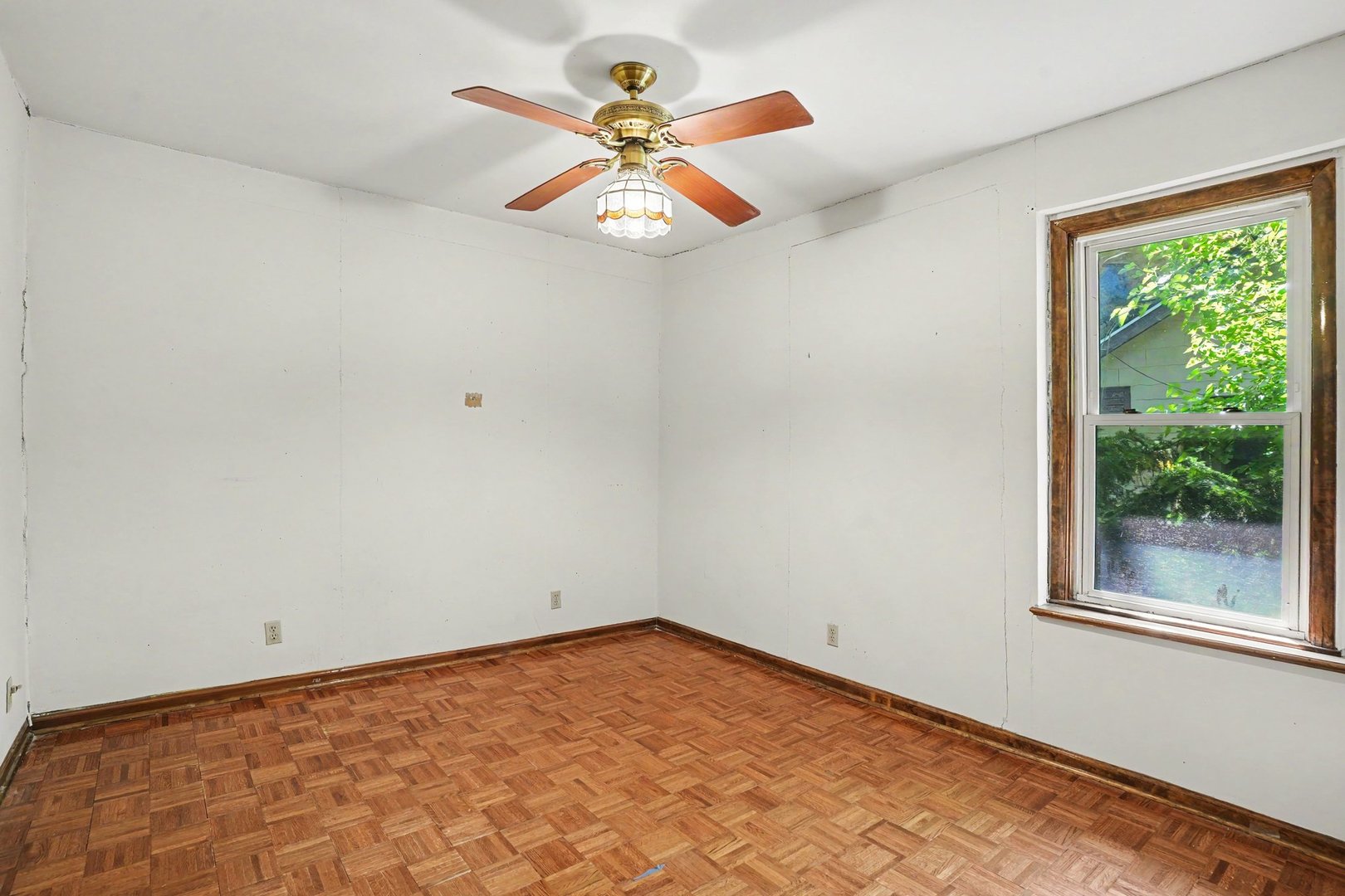 1661 Burr Oak Road Homewood, IL 60430 - Photo 9 of 17 an empty room with a window