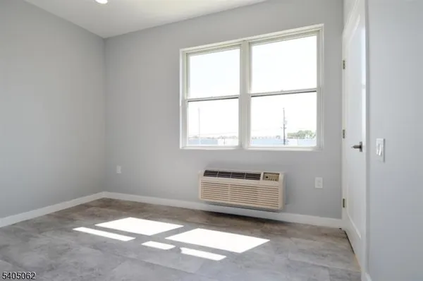 a view of a room that has a window in it