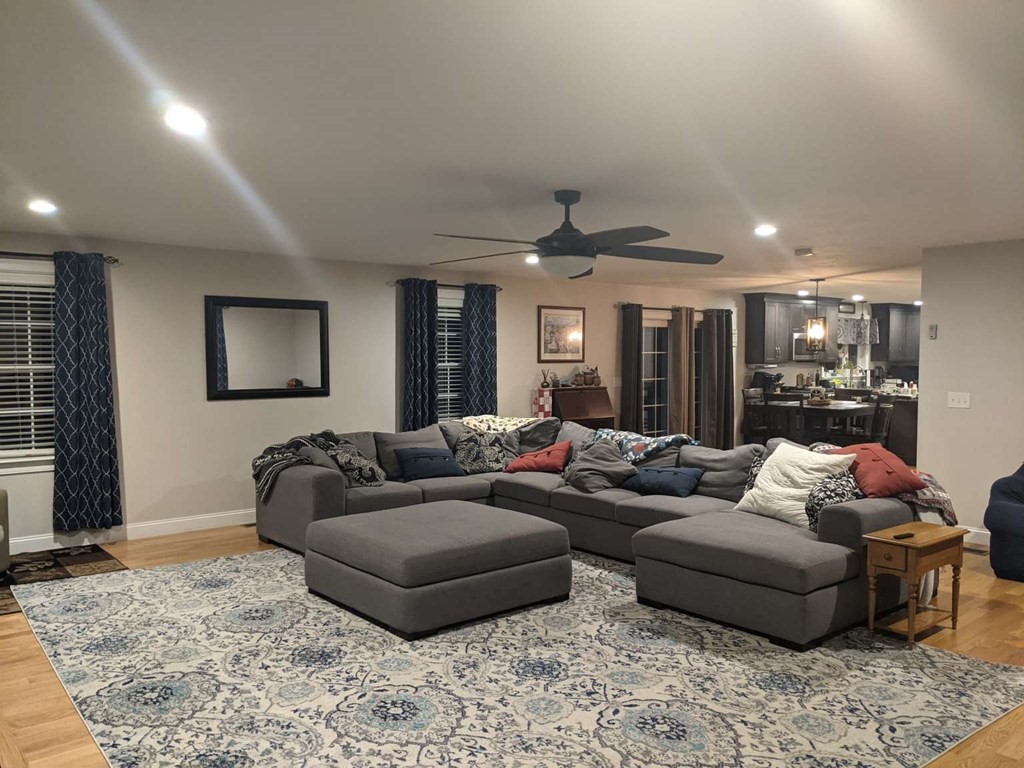 1 Quail Ridge Road Merrimac, MA 01860 - Photo 11 of 15 a living room with furniture and a rug