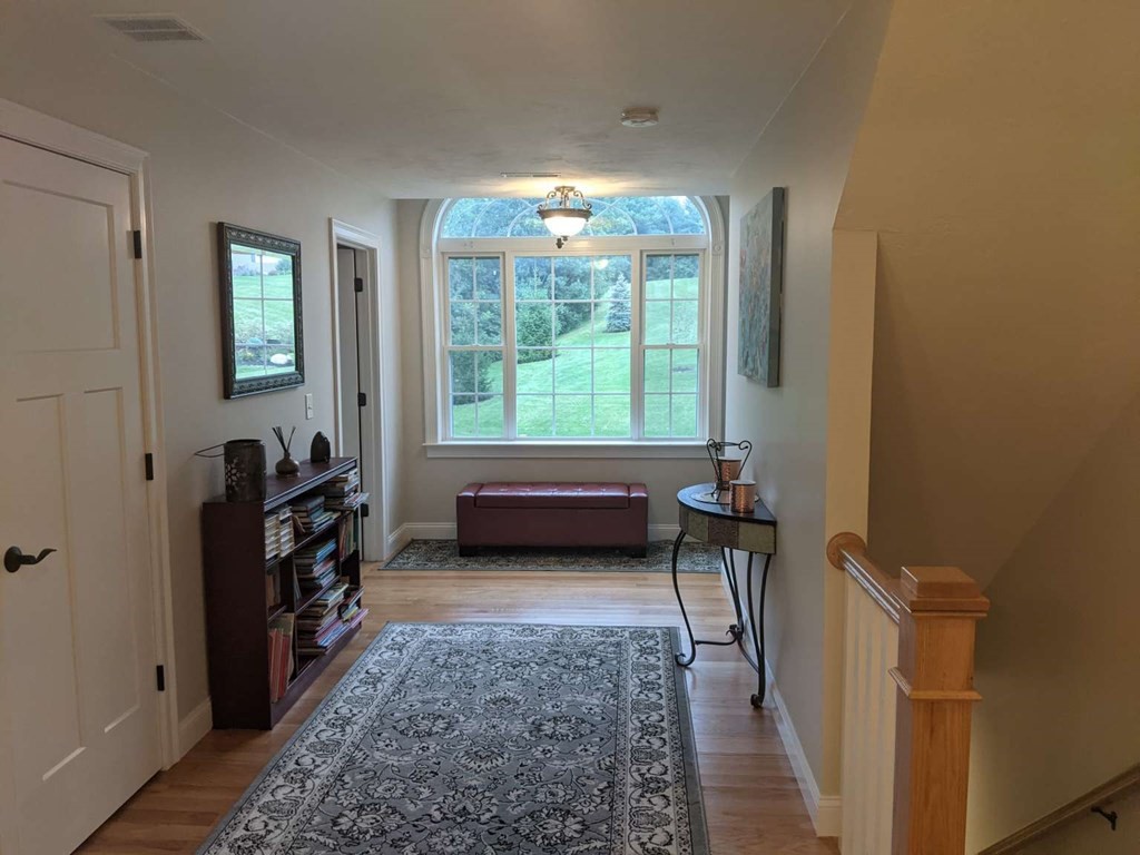 1 Quail Ridge Road Merrimac, MA 01860 - Photo 2 of 15 a living room with furniture and a flat screen tv