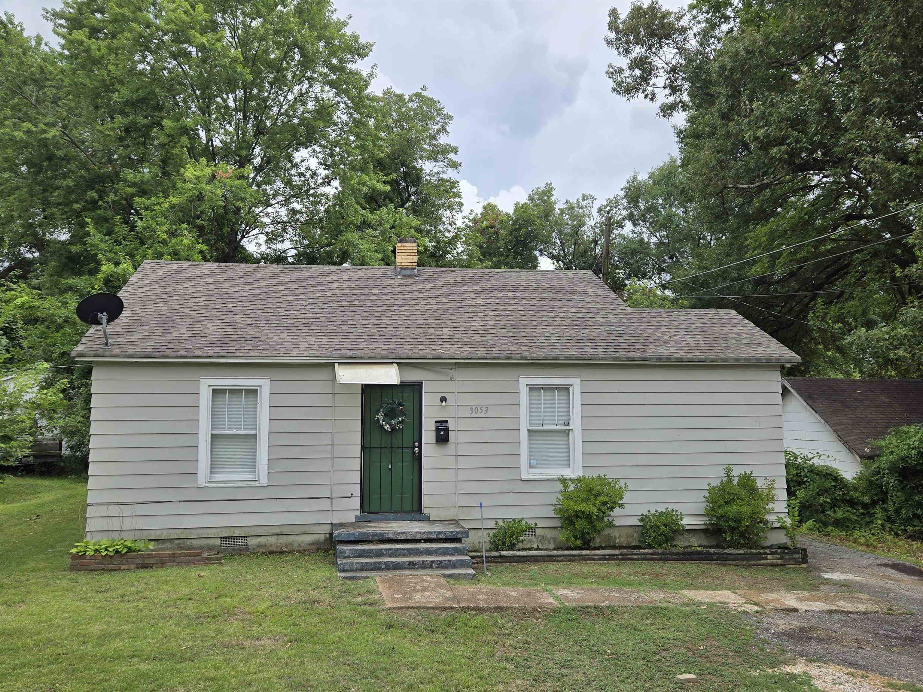 3053 Carrington Road Memphis, TN 38111 - Photo 1 of 17 View of front of property featuring a front yard