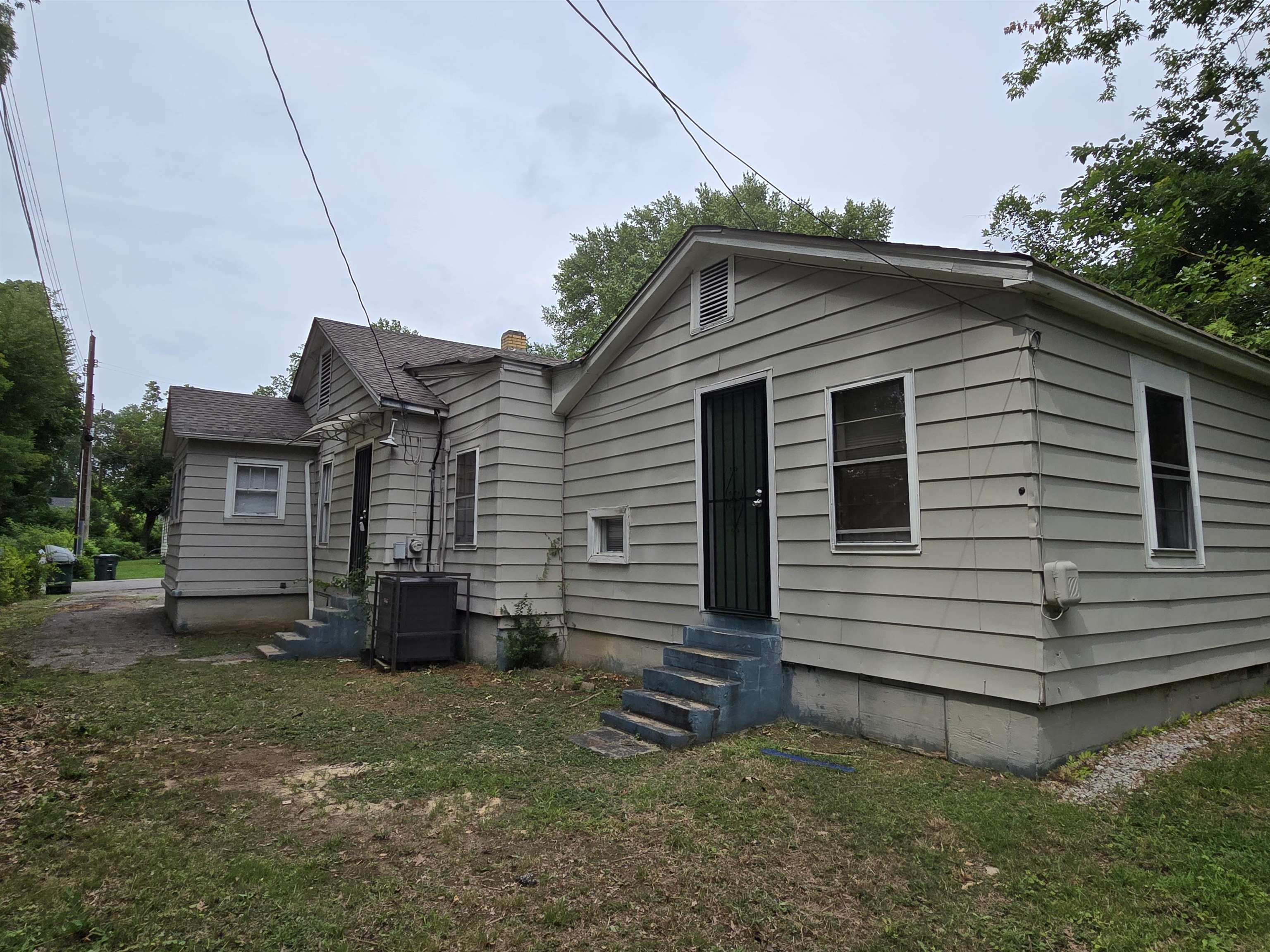 3053 Carrington Road Memphis, TN 38111 - Photo 5 of 17 Back of house with a lawn