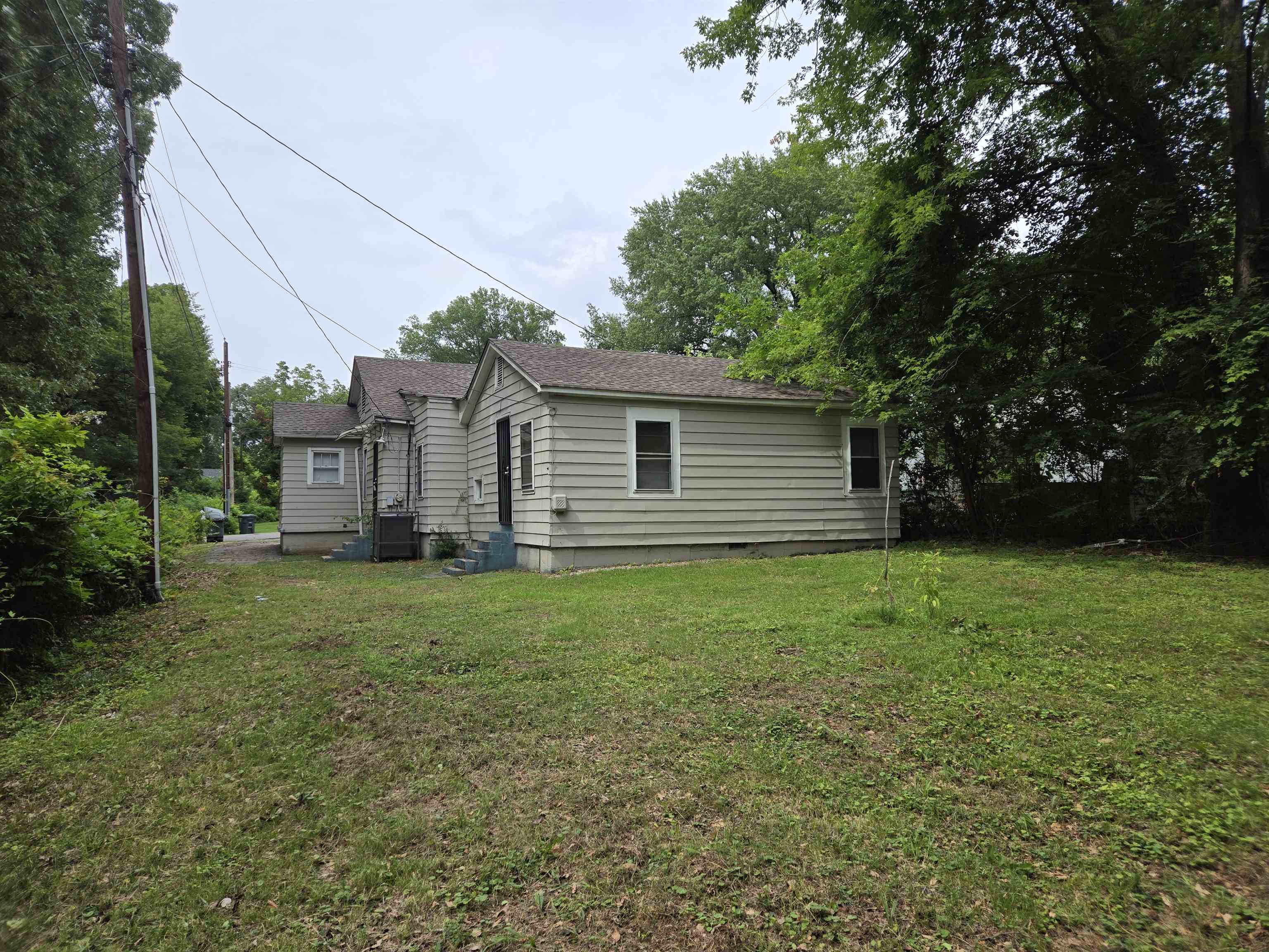 3053 Carrington Road Memphis, TN 38111 - Photo 6 of 17 Back of property featuring a lawn