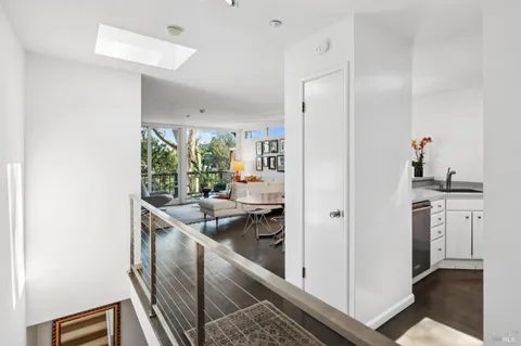 a kitchen with a stove and a refrigerator