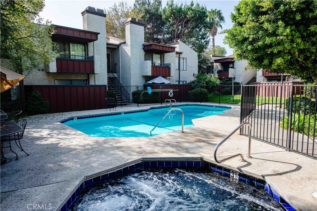 7135 Firmament Avenue, Unit 25 Van Nuys, CA 91406 - Photo 13 of 14 a view of a house with backyard and sitting area