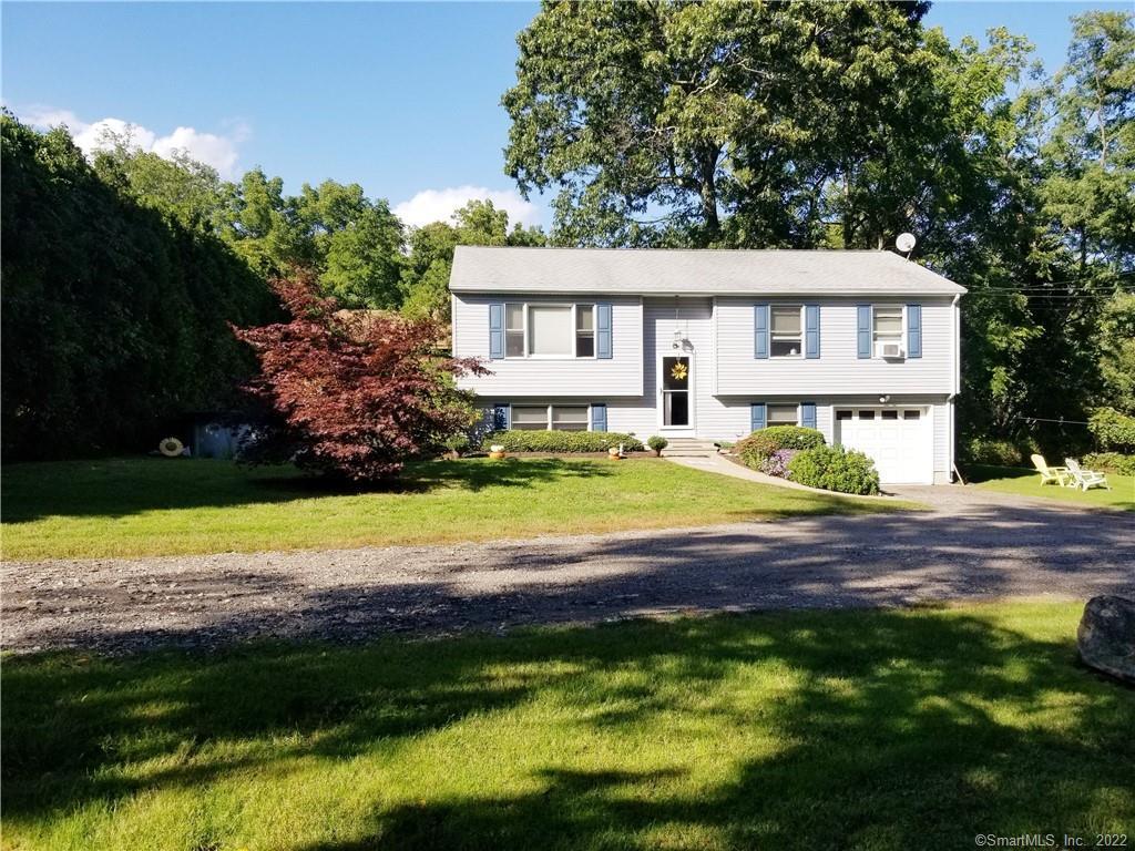 454 Flanders Road Groton, CT 06355 - Photo 1 of 1 a view of a house with swimming pool yard and a patio