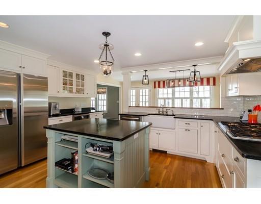 40 Pilgrim Road Wellesley, MA 02481 - Photo 5 of 23 a kitchen with kitchen island a sink stainless steel appliances and cabinets
