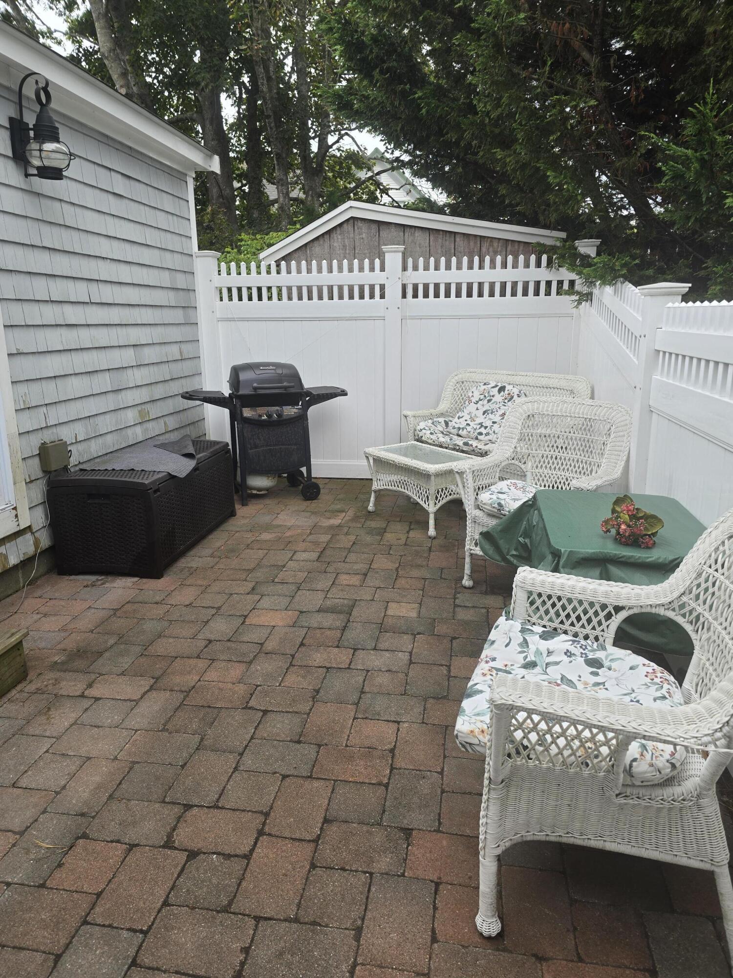 292 Route 28, Unit 1 Harwich, MA 02646 - Photo 20 of 29 a view of a terrace with furniture