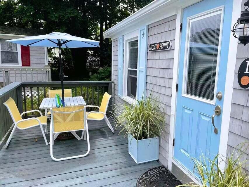 292 Route 28, Unit 1 Harwich, MA 02646 - Photo 24 of 29 a balcony with table and chairs