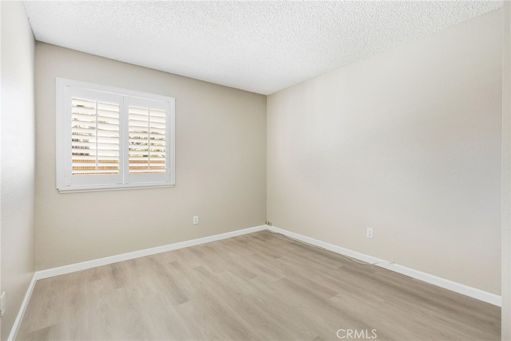 24333 Rimcrest Lane Moreno Valley, CA 92557 - Photo 22 of 62 an empty room with a window