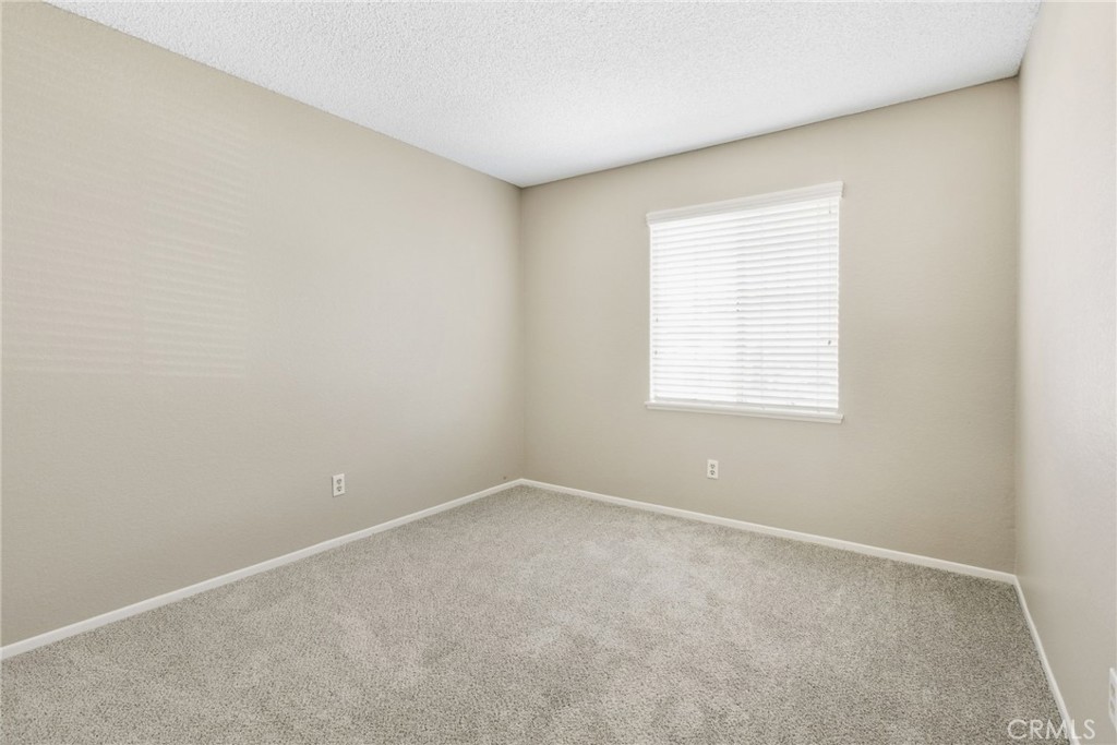 24333 Rimcrest Lane Moreno Valley, CA 92557 - Photo 26 of 62 an empty room with a window