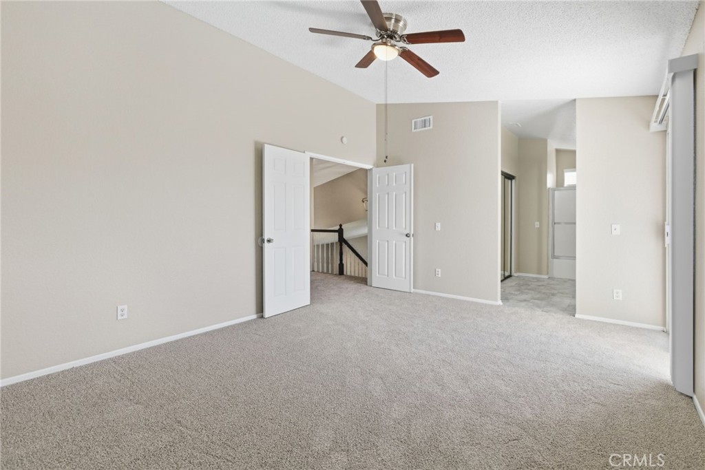 24333 Rimcrest Lane Moreno Valley, CA 92557 - Photo 30 of 62 a view of empty room with a ceiling fan