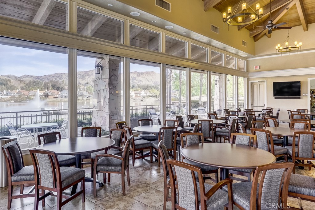 24333 Rimcrest Lane Moreno Valley, CA 92557 - Photo 44 of 62 a view of a dining room with furniture window and outside view