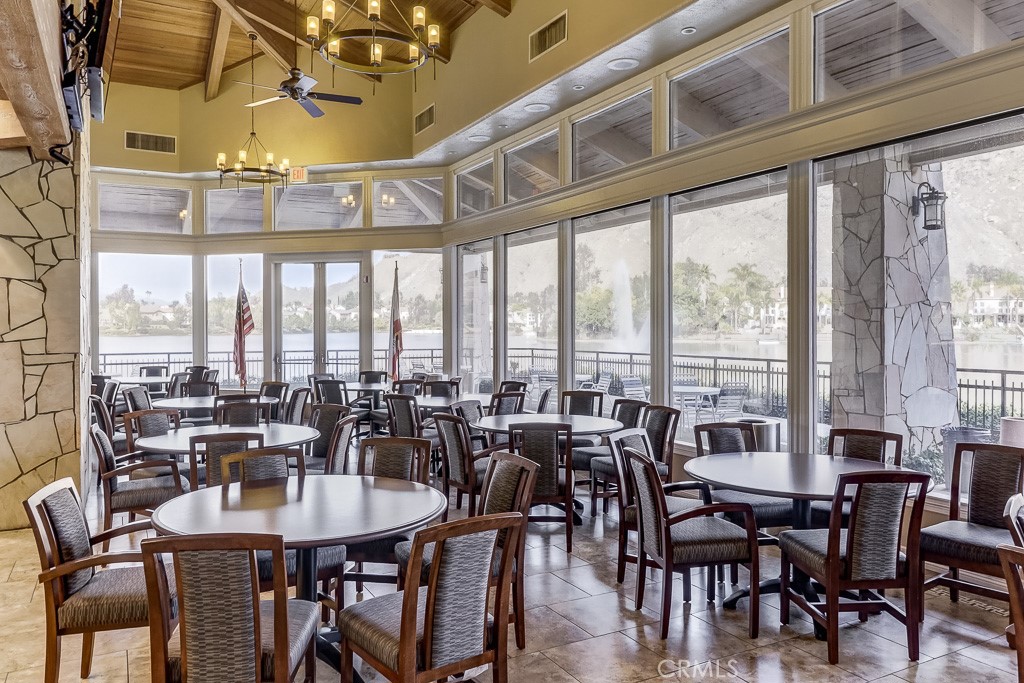 24333 Rimcrest Lane Moreno Valley, CA 92557 - Photo 45 of 62 a view of a dining room with furniture window and outside view