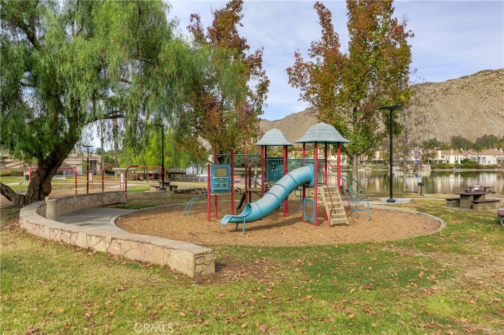 24333 Rimcrest Lane Moreno Valley, CA 92557 - Photo 52 of 62 a view of a park with swings and slides