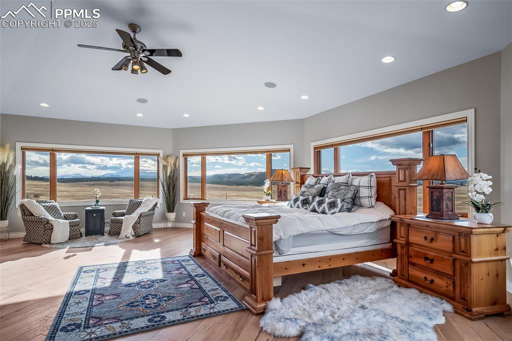 4586 East Best Road Larkspur, CO 80118 - Photo 22 of 50 Bedroom featuring light wood-type flooring, recessed lighting, and ceiling fan