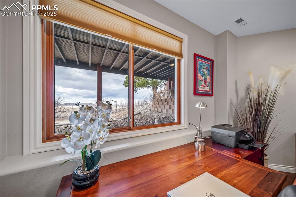 4586 East Best Road Larkspur, CO 80118 - Photo 34 of 50 Office view of a desk