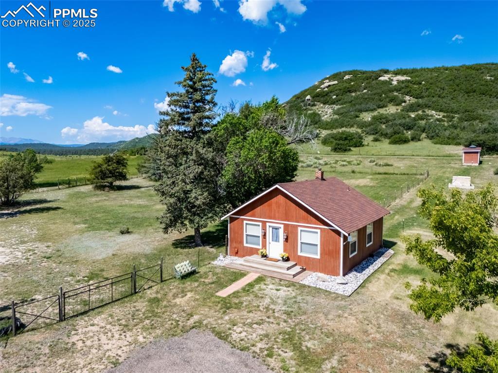 4586 East Best Road Larkspur, CO 80118 - Photo 42 of 50 Aerial view of sparsely populated area featuring mountains