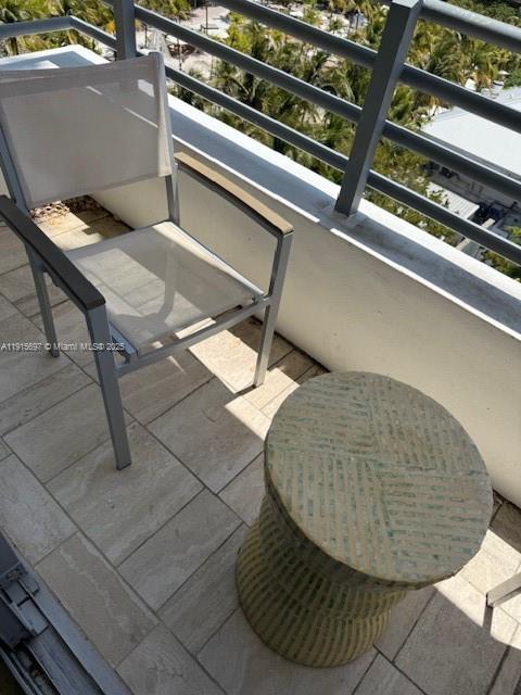 101 Ocean Drive, Unit 906 Miami Beach, FL 33139 - Photo 29 of 35 a view of a room with wooden floor and chair