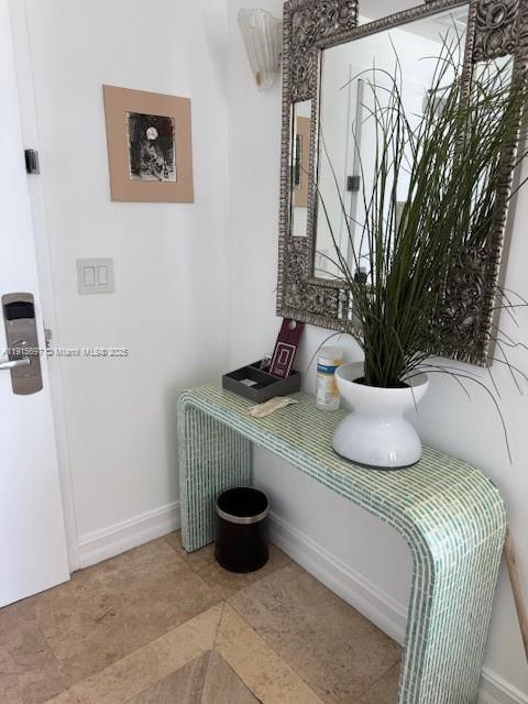 101 Ocean Drive, Unit 906 Miami Beach, FL 33139 - Photo 6 of 35 a bathroom with a sink and a mirror
