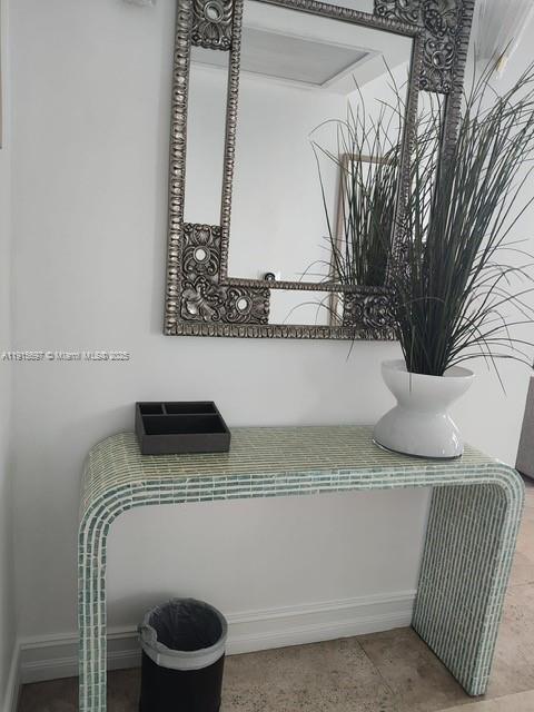 101 Ocean Drive, Unit 906 Miami Beach, FL 33139 - Photo 7 of 35 a utility room with a washer and dryer