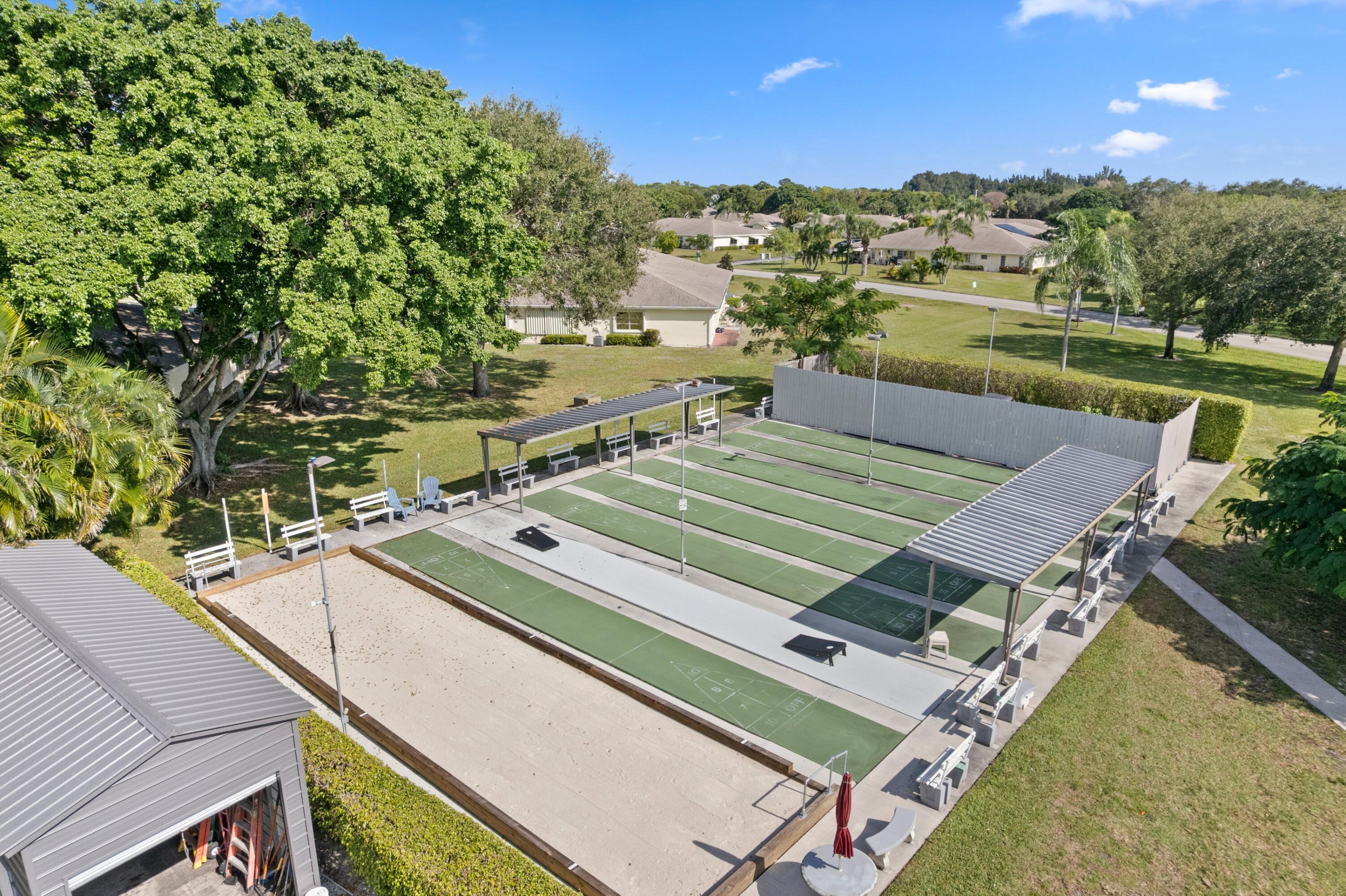 14609 Canalview Drive, Unit 231A Delray Beach, FL 33484 - Photo 16 of 33 a view of a pool with a lake view
