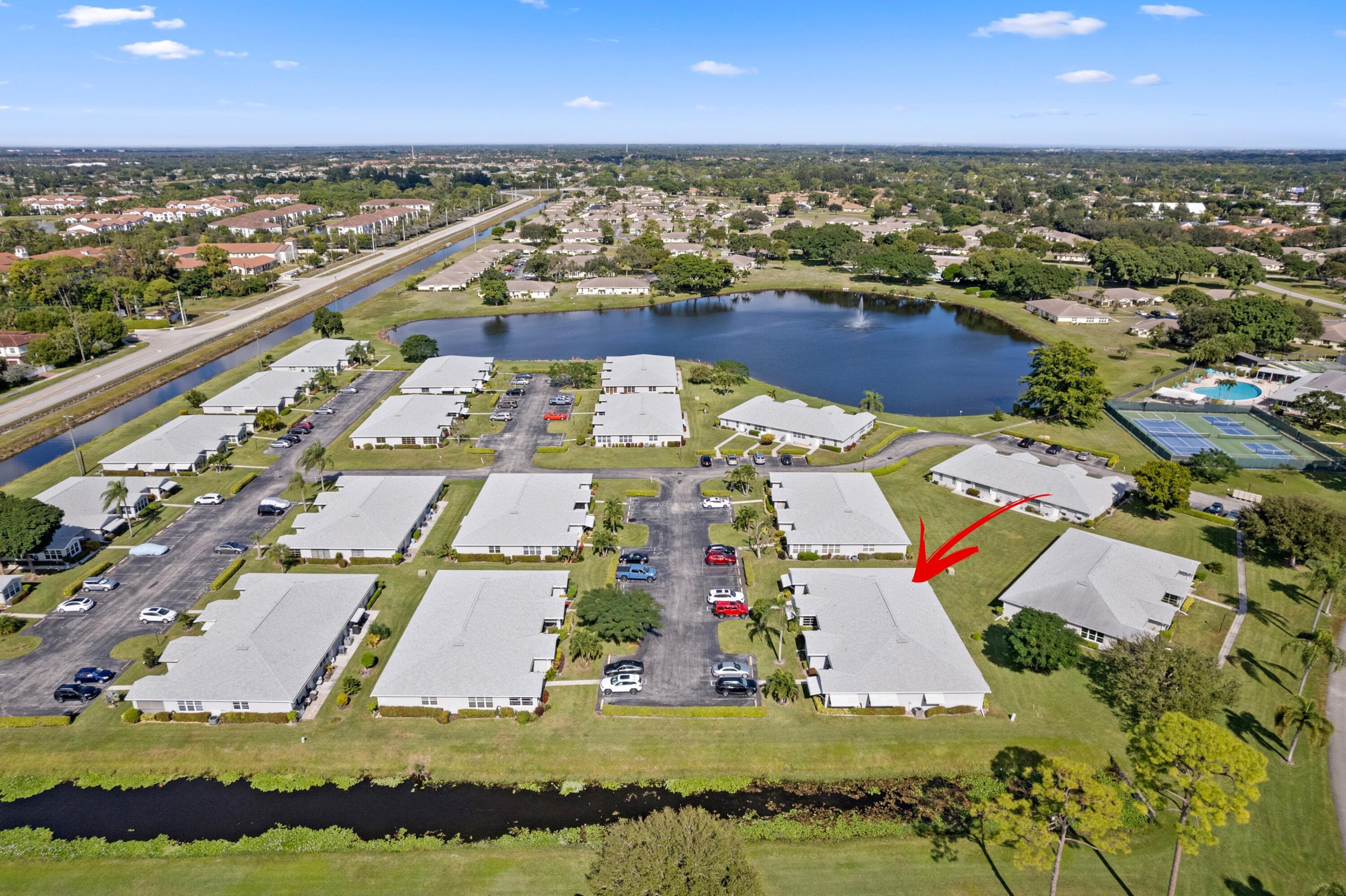 14609 Canalview Drive, Unit 231A Delray Beach, FL 33484 - Photo 18 of 33 an aerial view of residential houses with outdoor space