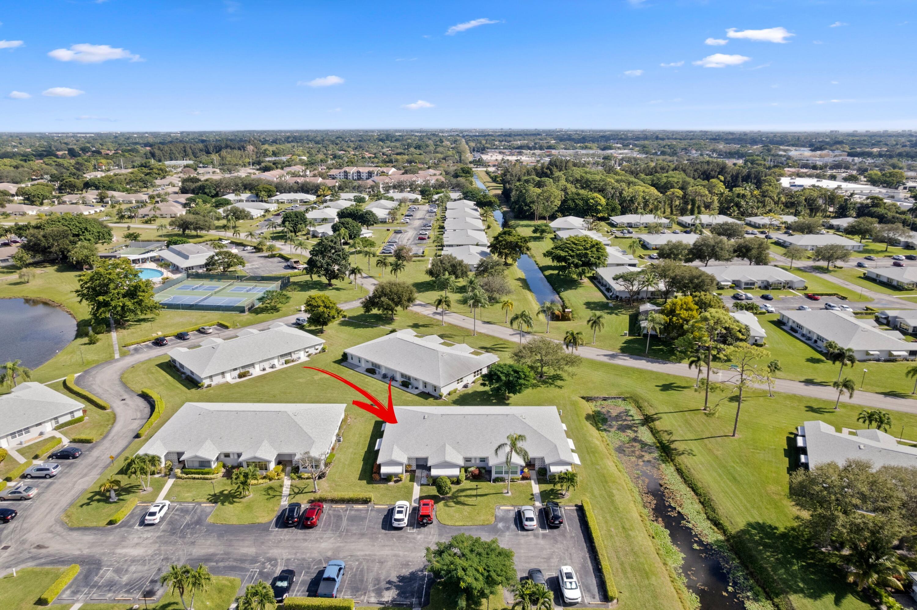 14609 Canalview Drive, Unit 231A Delray Beach, FL 33484 - Photo 19 of 33 an aerial view of residential houses with outdoor space