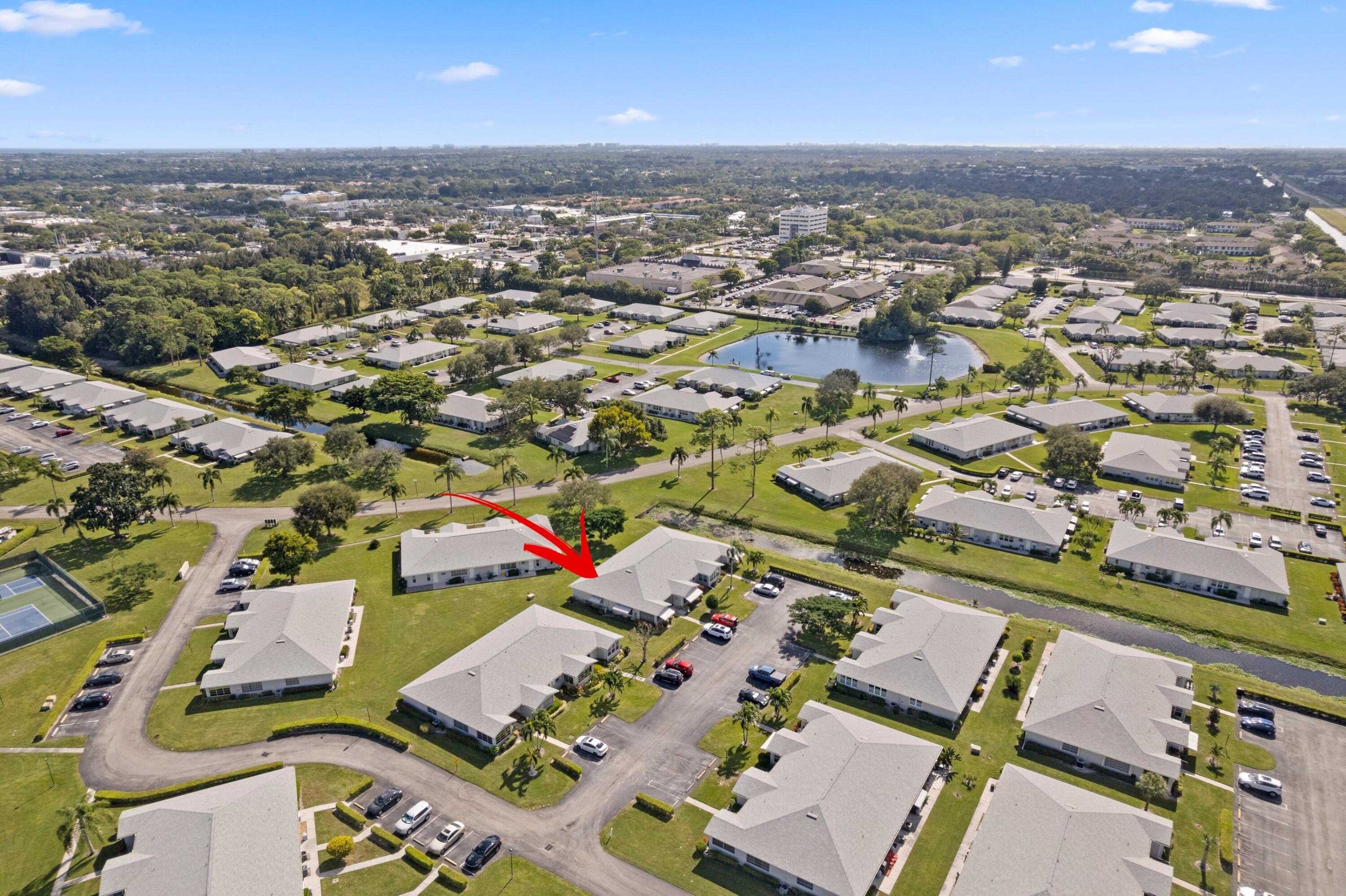 14609 Canalview Drive, Unit 231A Delray Beach, FL 33484 - Photo 20 of 33 an aerial view of a city with lots of residential buildings