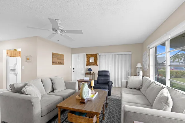 a living room with furniture or couch and a window